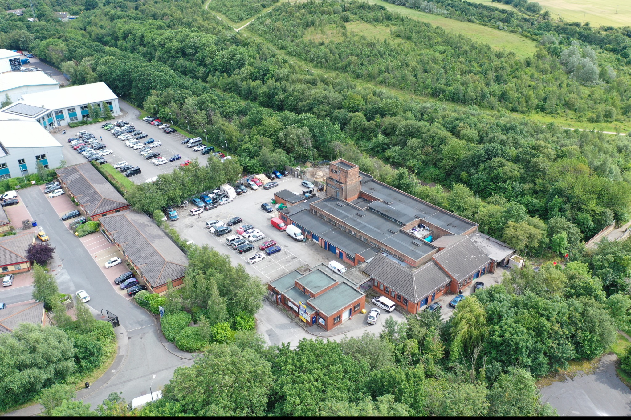 Aerial photograph of the Shireoaks buildings, courtyards and surrounding woodland
