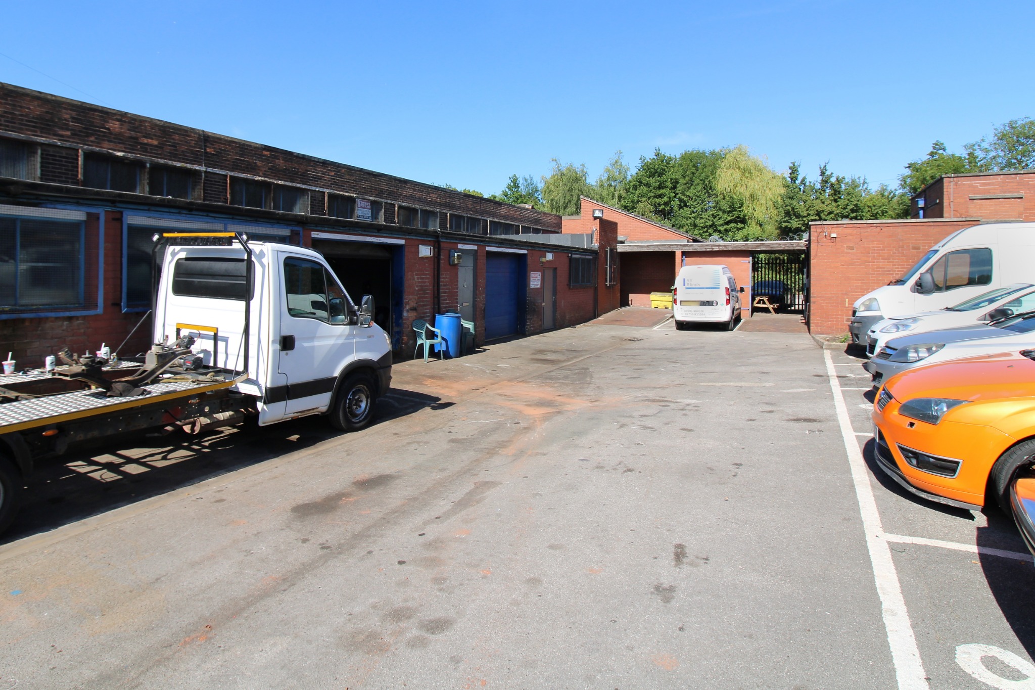 Businesses and vehicles in the Shireoaks courtyard